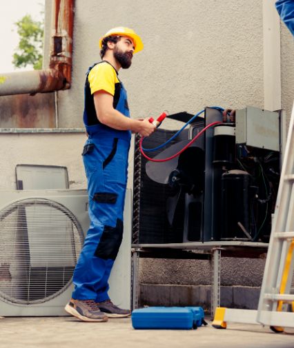 mechanics checking for hvac system